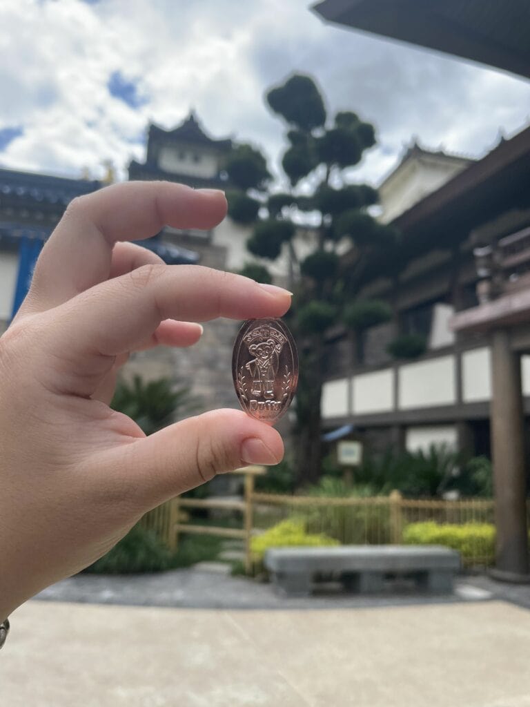 japan epcot duffy coin